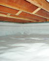 a moisture barrier installed on the walls and floors of a crawl space in Panama City Beach
