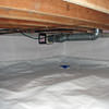 A heating duct extends along this sealed crawl space in Daytona Beach.