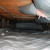 A sealed crawl space with an insulated hot air duct in Marianna.
