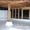 A large, encapsulated crawl space with our vapor barrier system installed in Panama City.