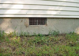 Open crawl space vents that let rodents, termites, and other pests in a home in Carrabelle