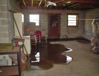 a flooded basement floor in a Gretna home