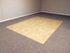 Tiled, carpeted, and parquet basement flooring options for basement floor finishing in Quincy