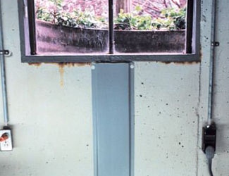 Repaired waterproofed basement window leak in Perry